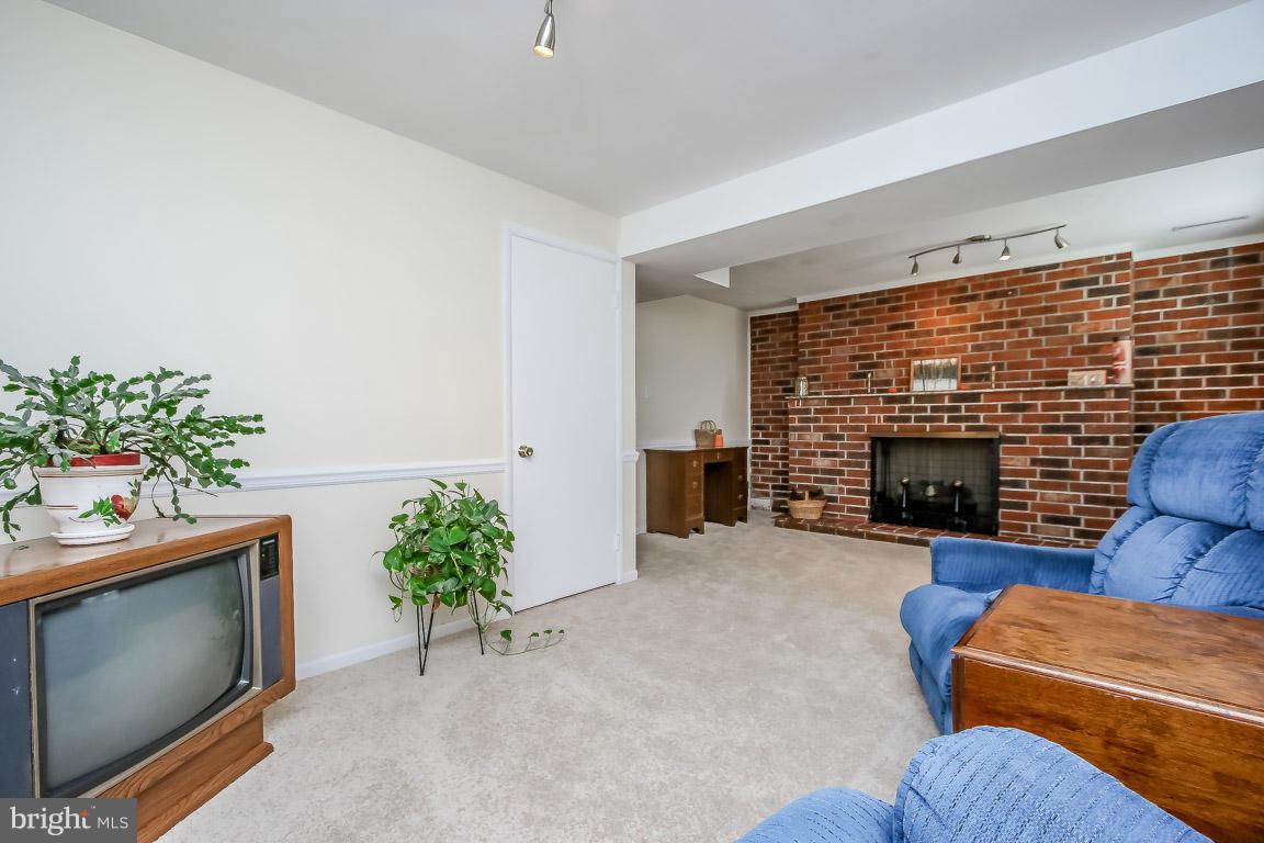 765 Stevenson Road Severn, MD 21144 - Photo 19 of 29 Family Room with Fireplace