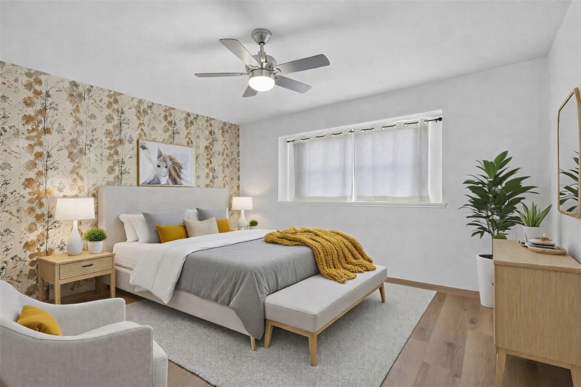 11807 South Ridgewood Circle Houston, TX 77071 - Photo 13 of 18 a bedroom with a bed and window