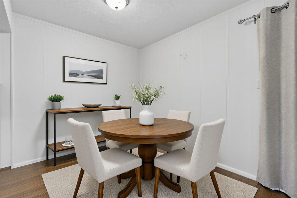 11807 South Ridgewood Circle Houston, TX 77071 - Photo 7 of 18 a dining room with furniture and wooden floor