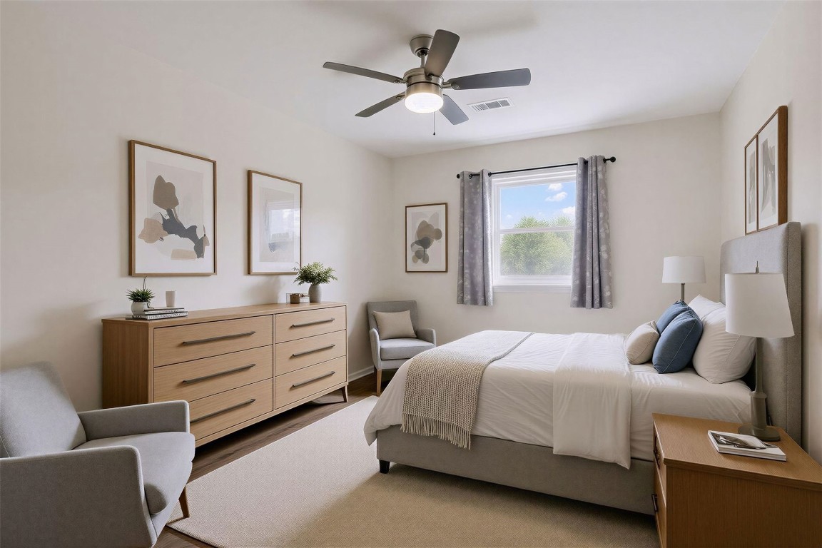 11807 South Ridgewood Circle Houston, TX 77071 - Photo 8 of 18 a bedroom with a bed and a dresser