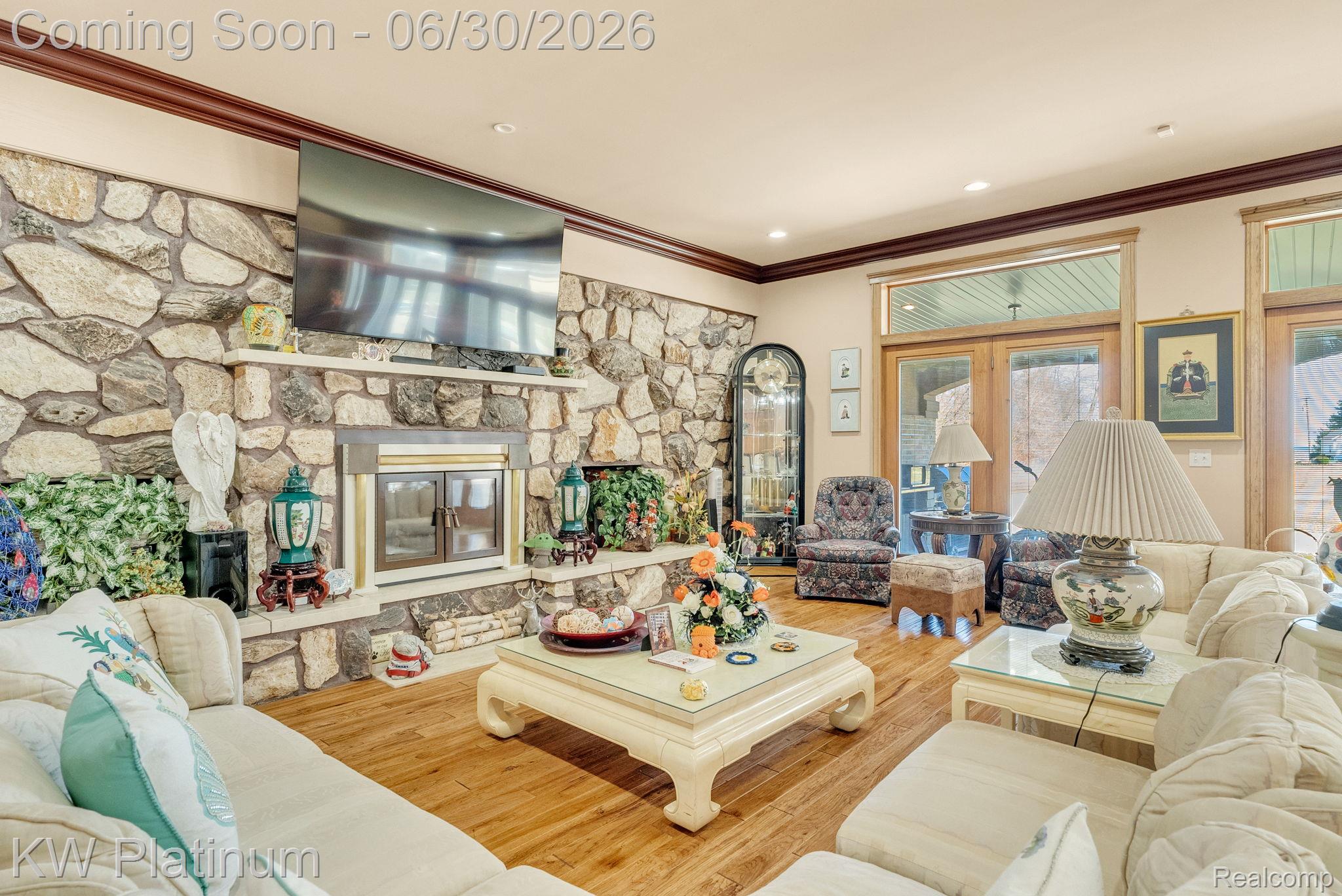 2235 South Lake Shore Road Harbor Beach, MI 48441 - Photo 15 of 99 Stone-faced fireplace with a white mantel and hearth