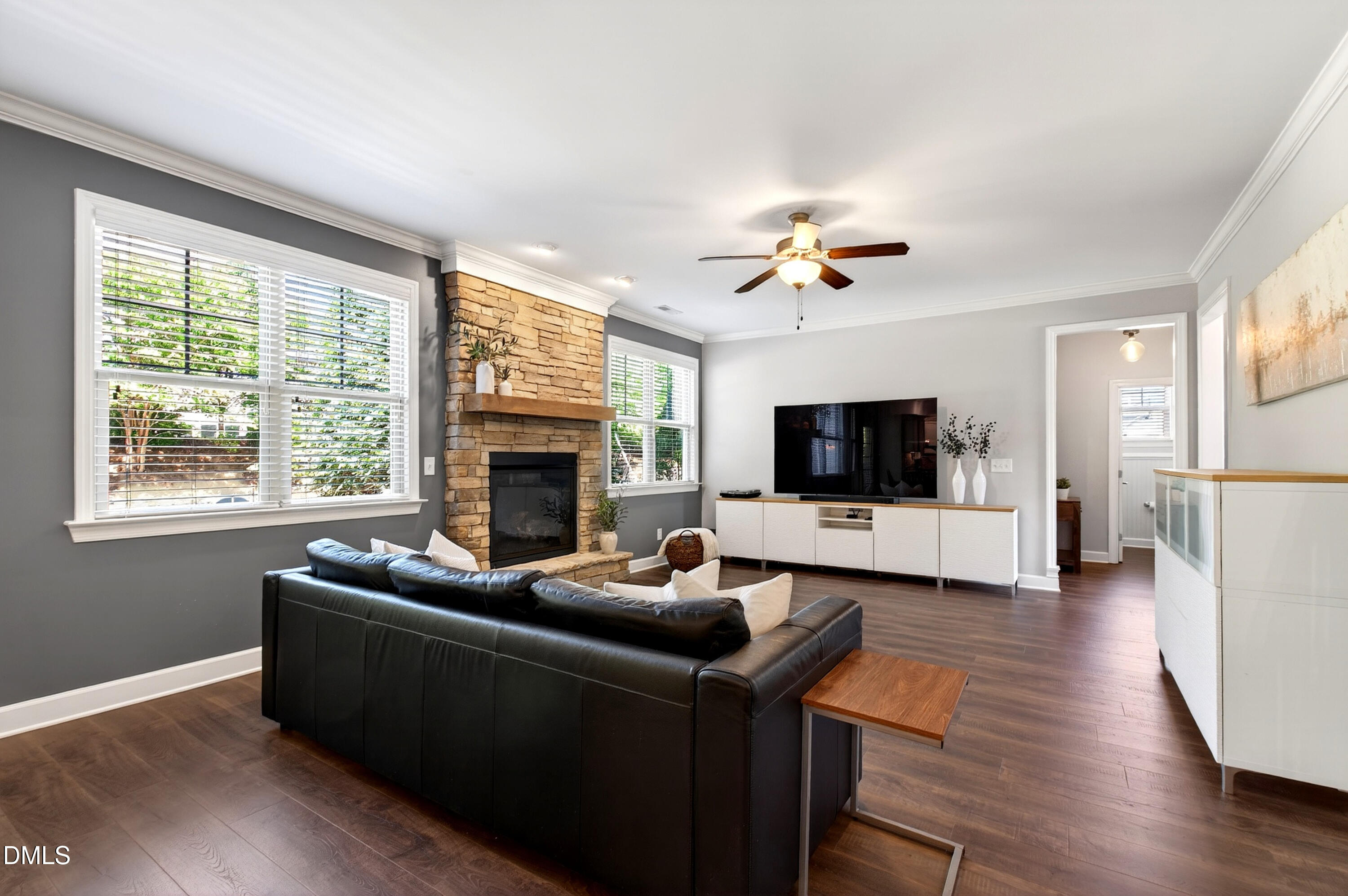 313 Karpen Lane Cary, NC 27519 - Photo 4 of 86 a living room with furniture fireplace and flat screen tv