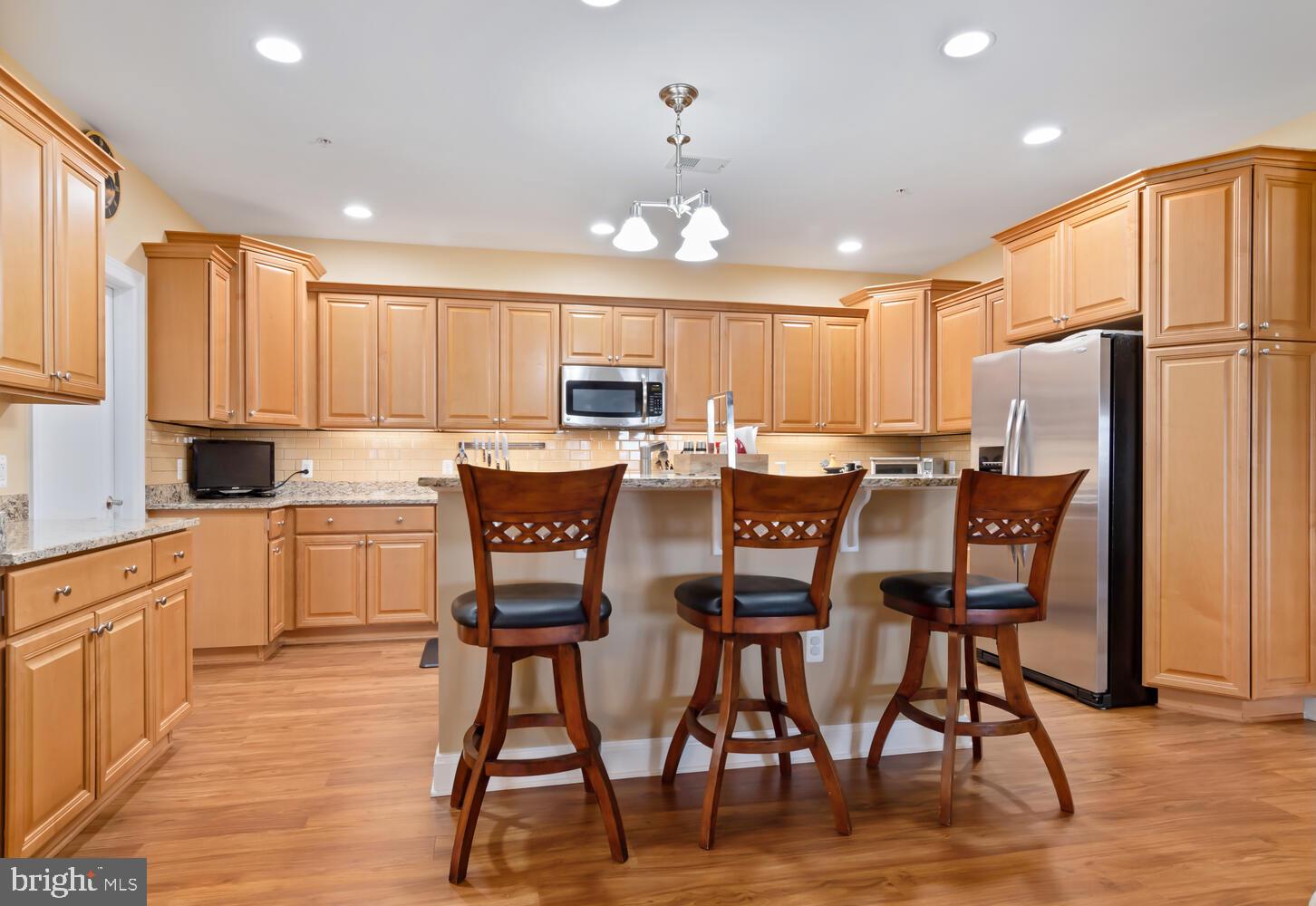 301 Muir Street, Unit 502 Cambridge, MD 21613 - Photo 12 of 53 Kitchen Island with Breakfast Bar