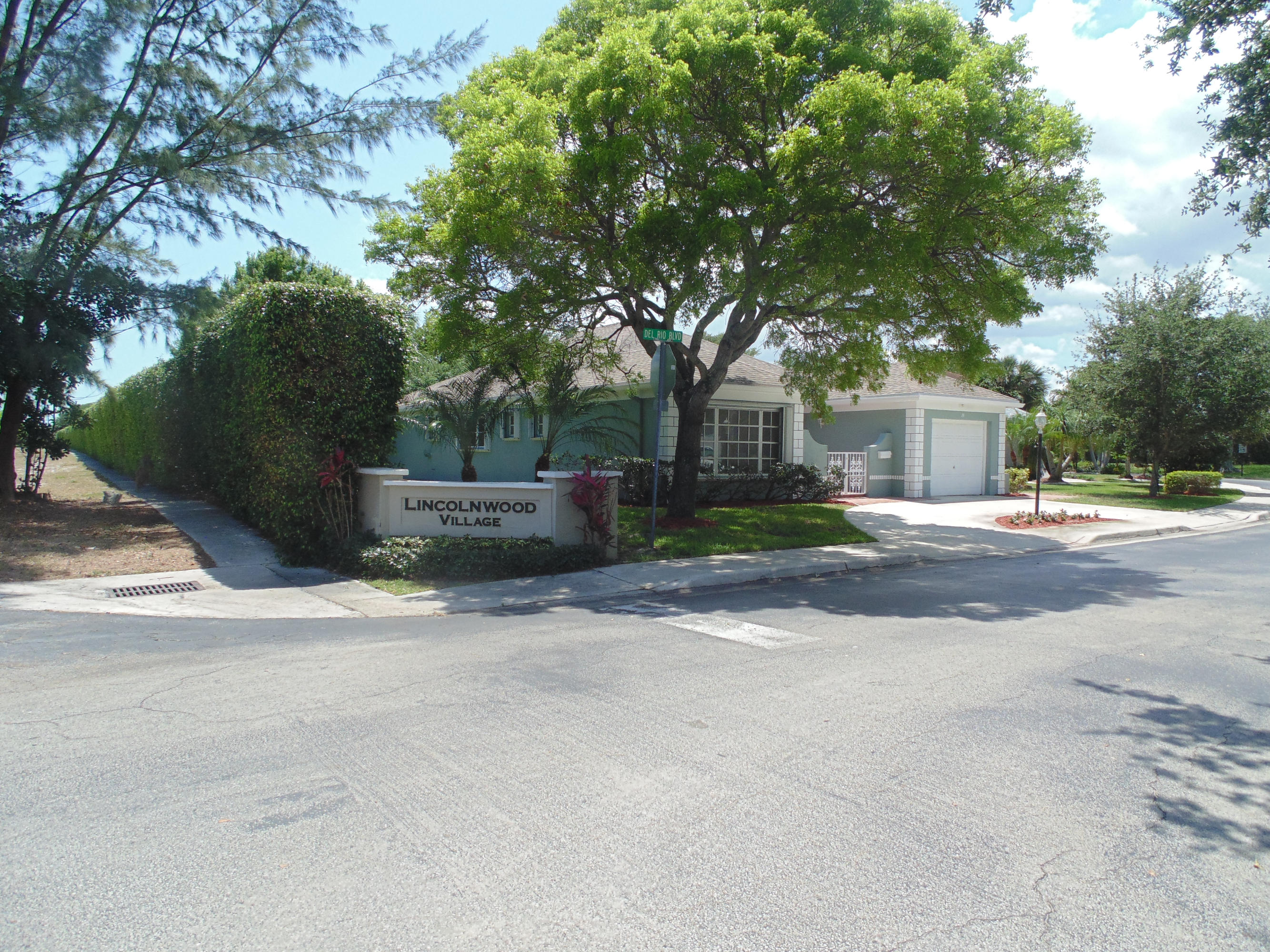 24 Del Rio Boulevard Boca Raton, FL 33432 - Photo 1 of 35 Village entrance