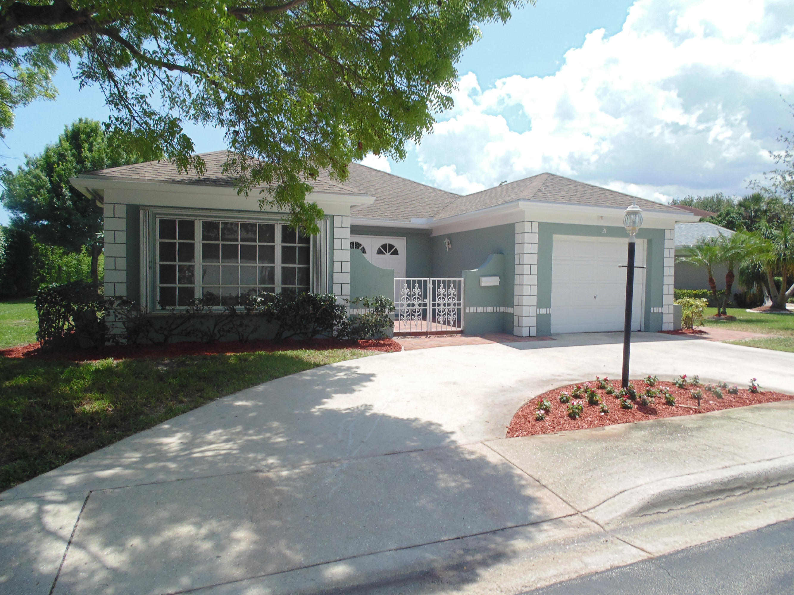 24 Del Rio Boulevard Boca Raton, FL 33432 - Photo 4 of 35 Exterior Front
