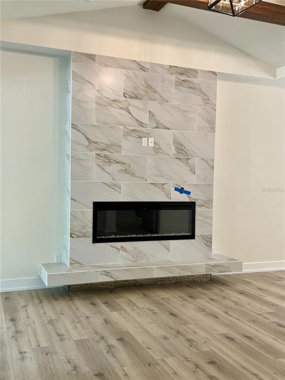 3189 Northwest 135th Way Gainesville, FL 32606 - Photo 12 of 16 a living room with a fireplace