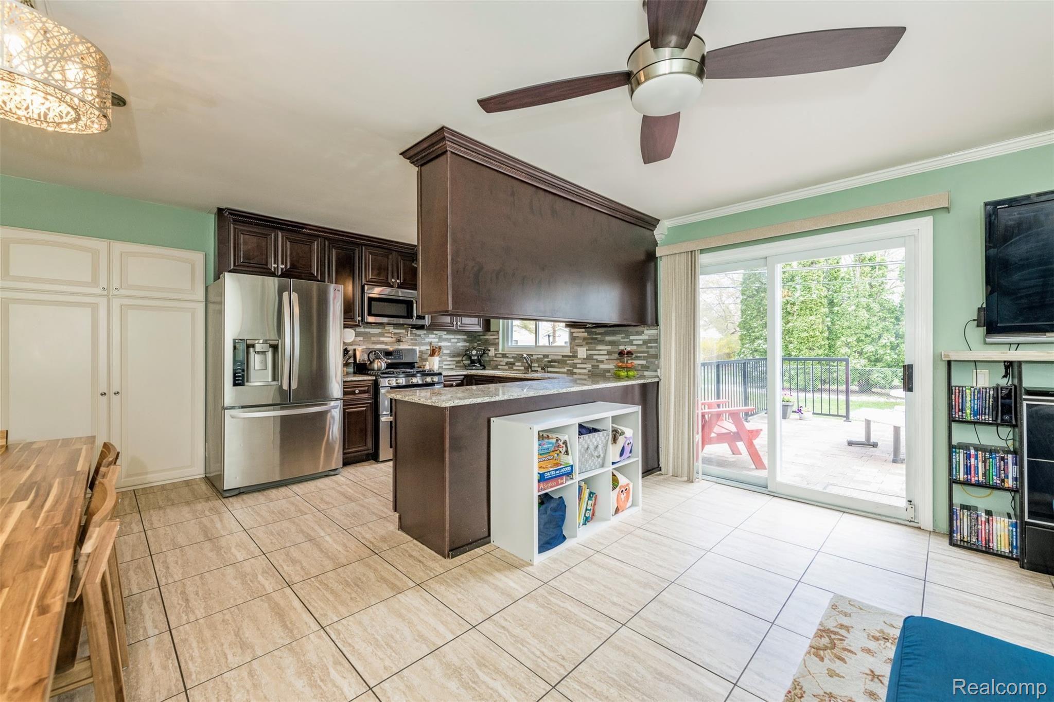 23434 Meadowbrook Road Novi, MI 48375 - Photo 13 of 29 Great layout for entertaining or quiet dinners with access to brick paver patio and backyard