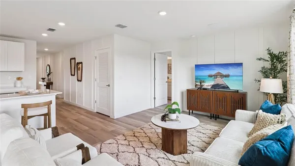 a living room with furniture and a table