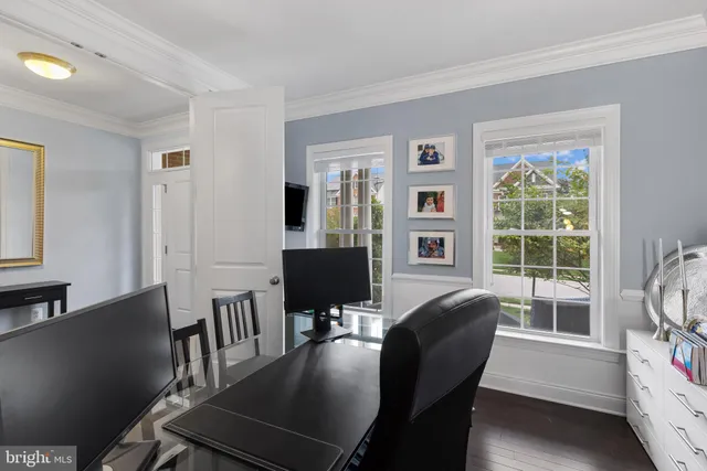 a spacious bedroom with a bed and window