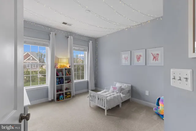 a room with furniture and a flat screen tv