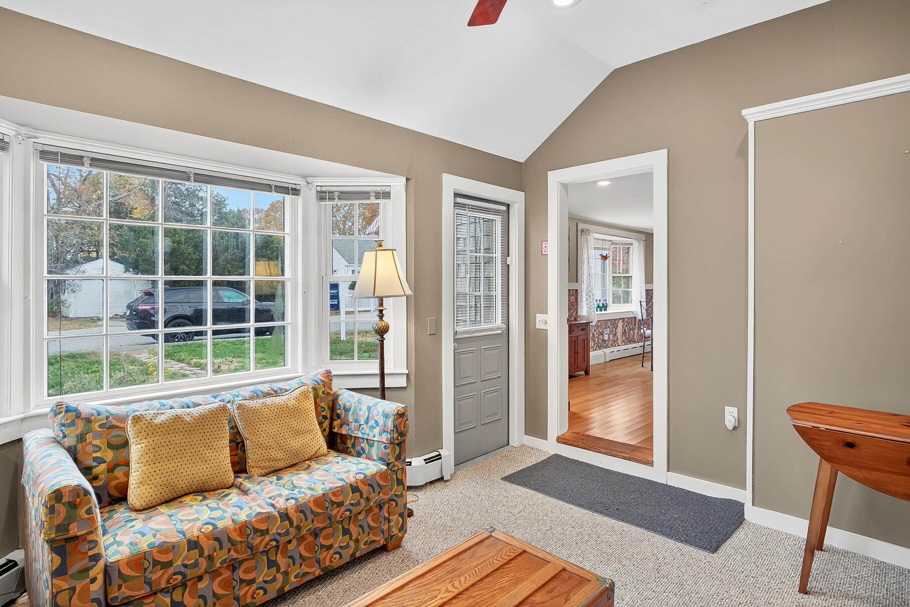 87 Spring Street Hyannis, MA 02601 - Photo 4 of 27 a living room with furniture and a window