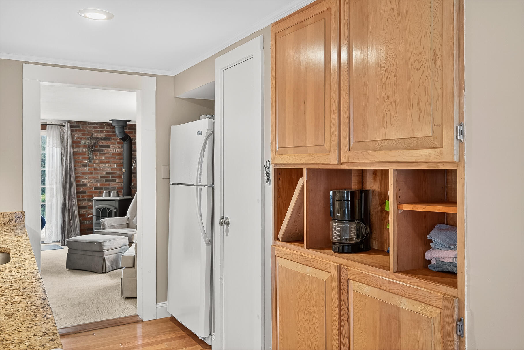 87 Spring Street Hyannis, MA 02601 - Photo 7 of 27 a view of kitchen with stainless steel appliances granite countertop cabinets and a refrigerator