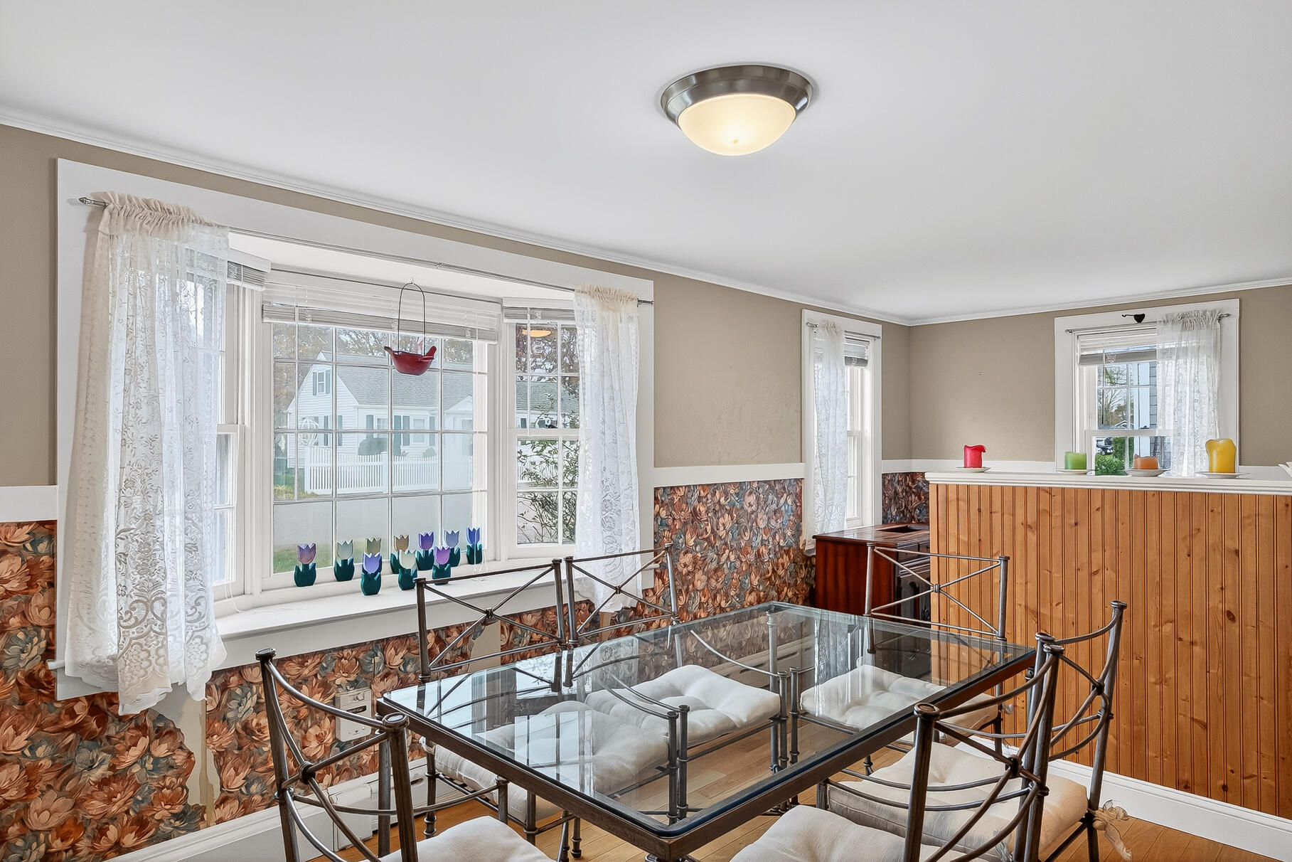 87 Spring Street Hyannis, MA 02601 - Photo 9 of 27 a dining room with furniture and a window