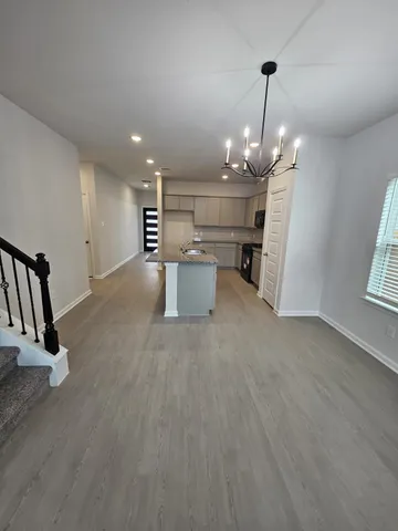 a view of a kitchen with a sink