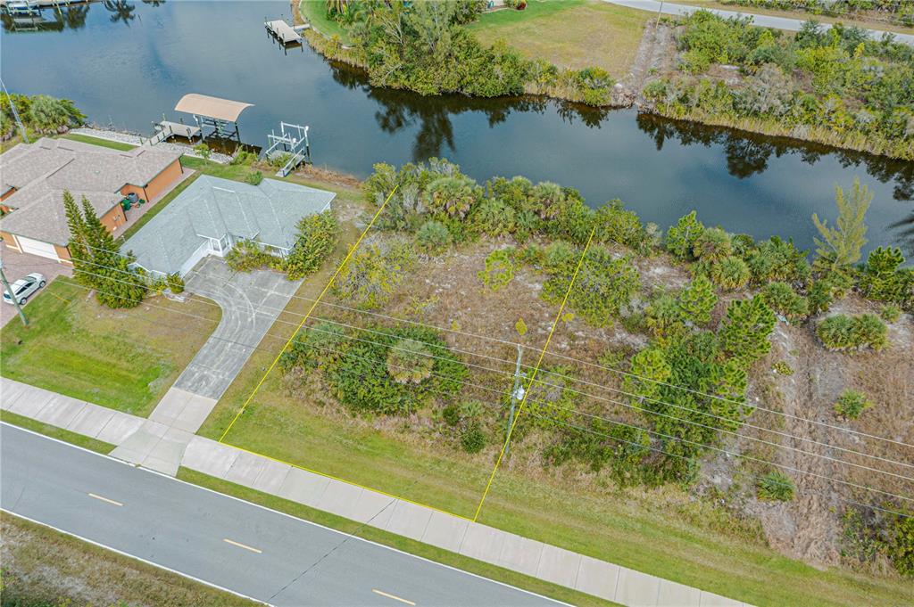 an aerial view of lake houses with outdoor space