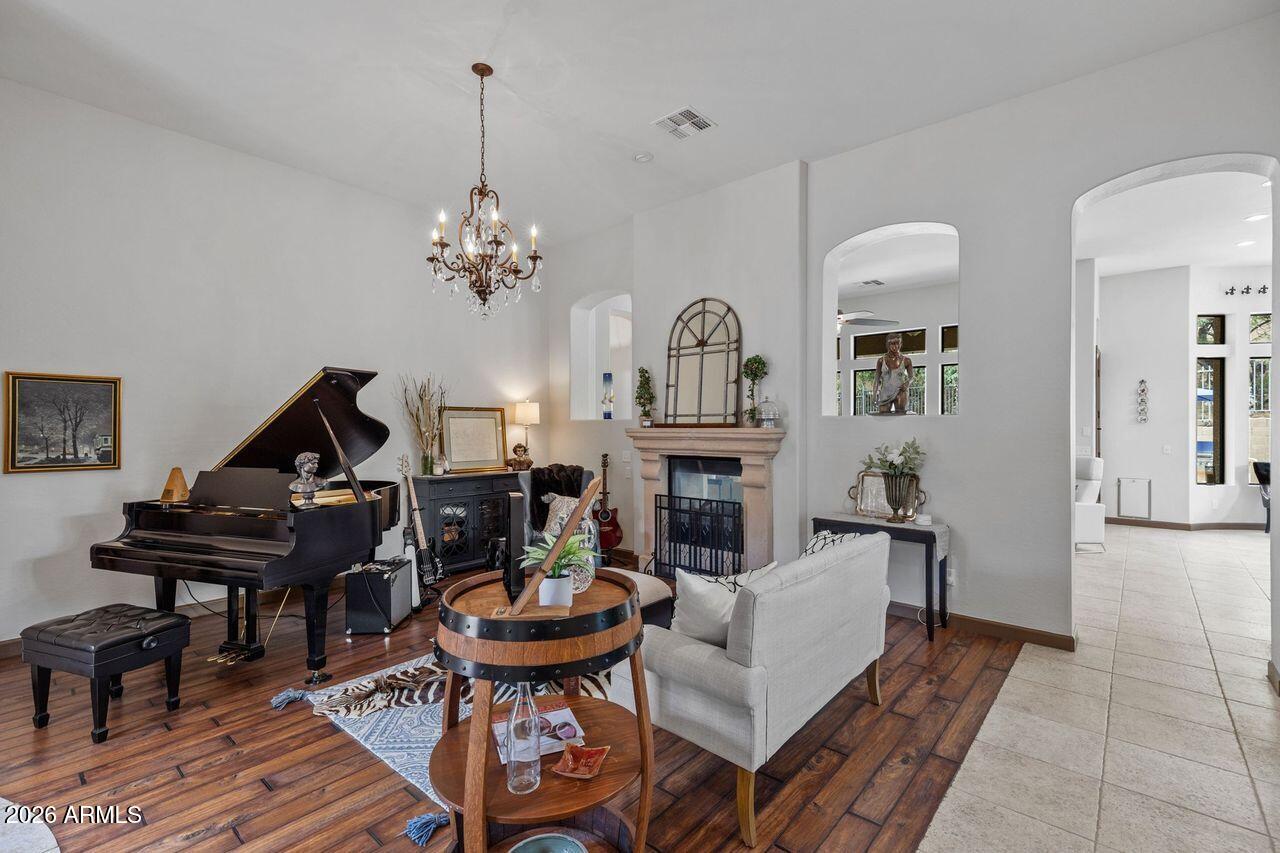 4107 North Silver Ridge Circle Mesa, AZ 85207 - Photo 12 of 67 Stone two-way fireplace