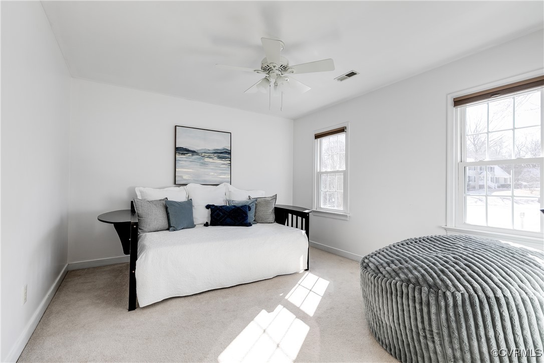5300 Krag Road Chester, VA 23831 - Photo 18 of 33 a bedroom with a bed and a large mirror