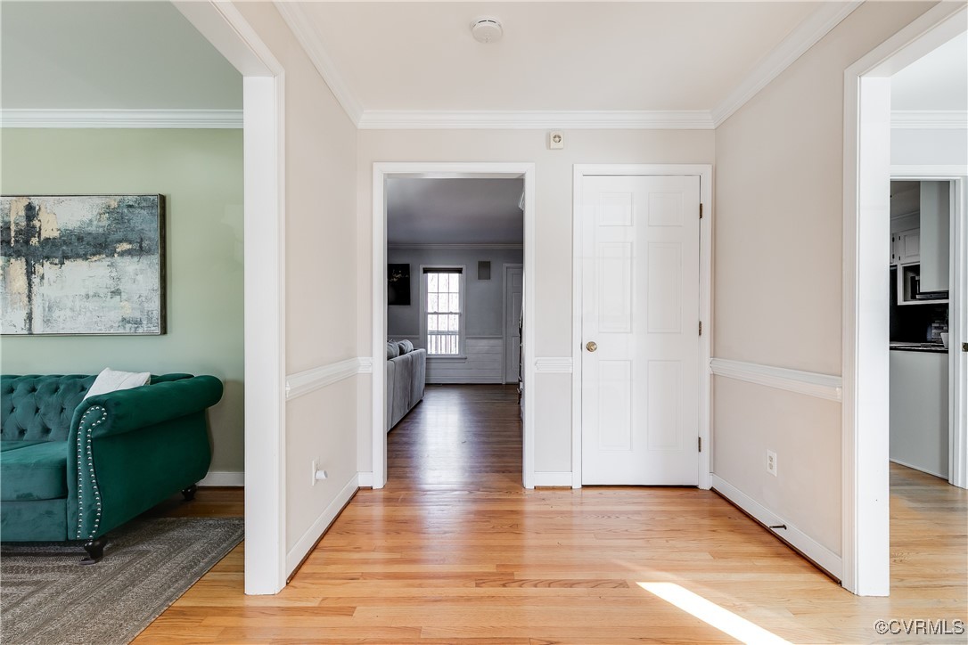 5300 Krag Road Chester, VA 23831 - Photo 2 of 33 a view of a hallway with wooden floor and furniture