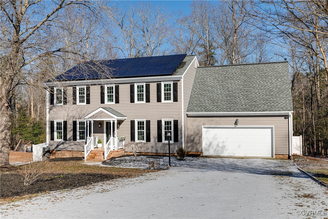 5300 Krag Road Chester, VA 23831 - Photo 33 of 33 a front view of a house with a yard and garage