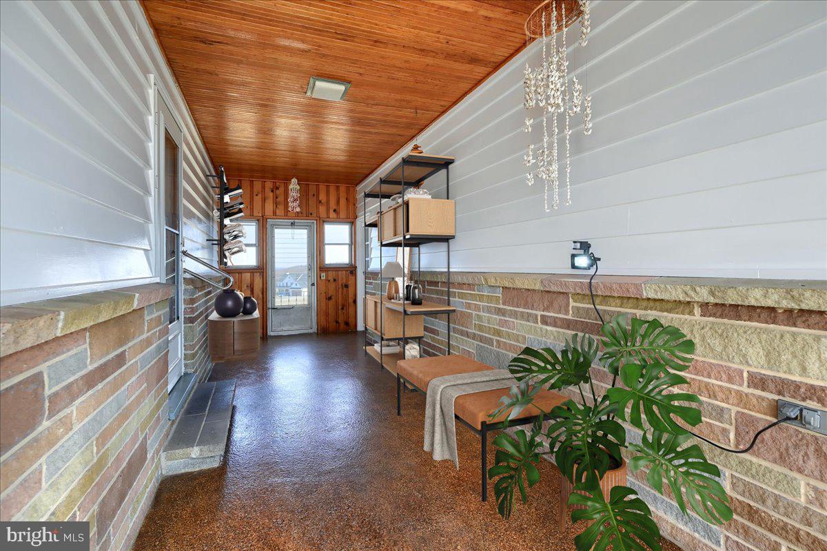 522 Broad St Extension Delta, PA 17314 - Photo 26 of 44 Virtually staged breezeway