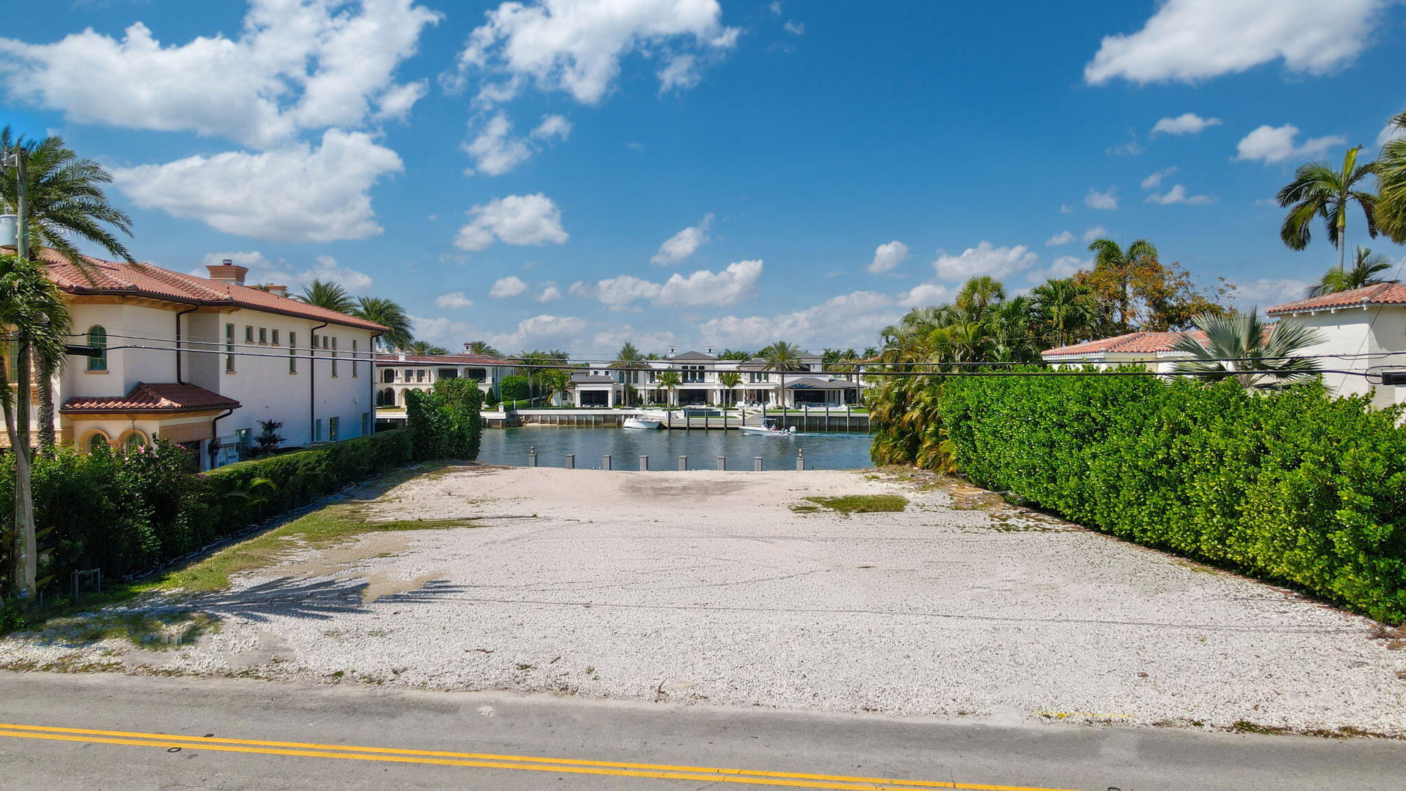 601 Northeast Spanish Trail Boca Raton, FL 33432 - Photo 15 of 16 a view of a street with a houses