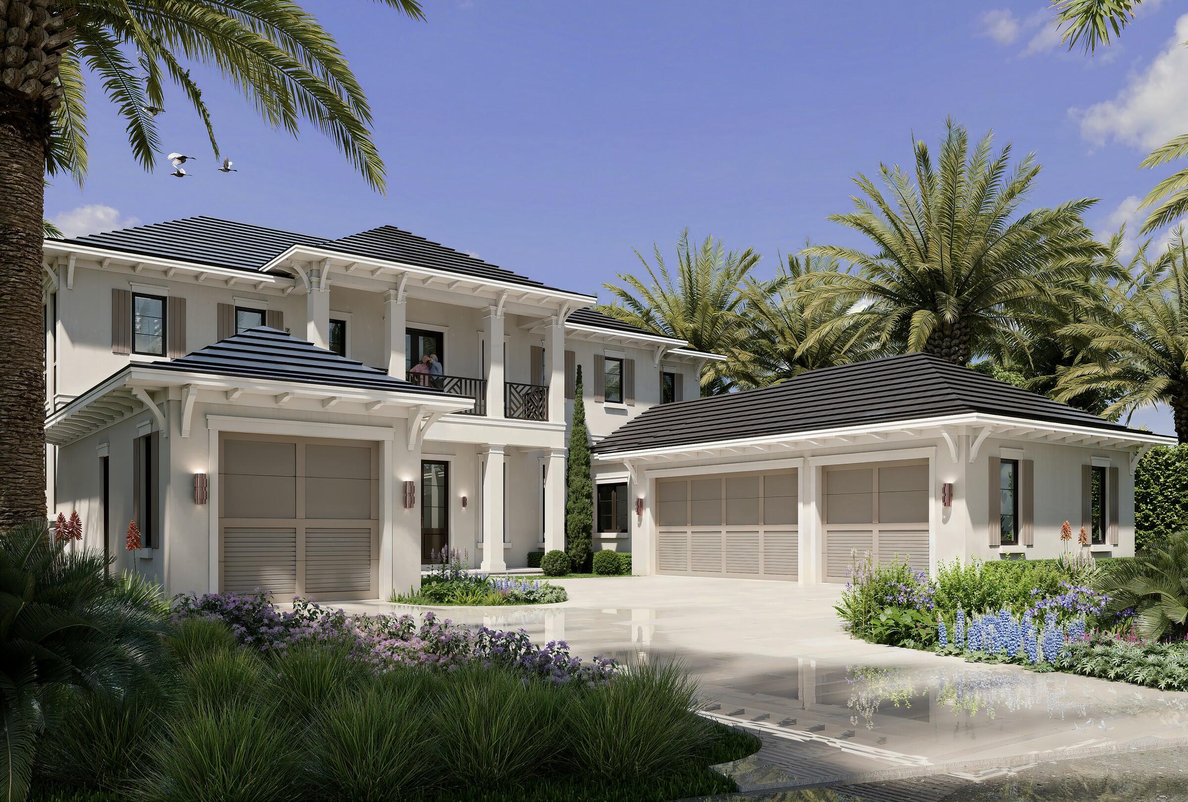 601 Northeast Spanish Trail Boca Raton, FL 33432 - Photo 2 of 16 a front view of a house with a garden