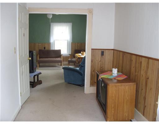 161 Riverside Street Milo, ME 04463 - Photo 12 of 13 Living Room. Livingroom looking to...