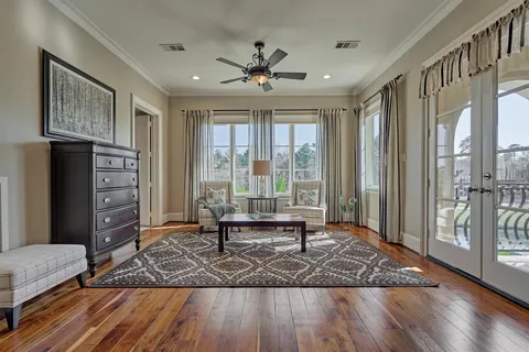 a spacious bathroom with a granite countertop sink a mirror and a vanity