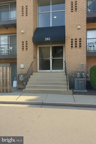 a front view of a house with a garage