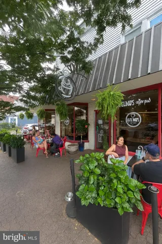 a view of a chairs and tables in patio