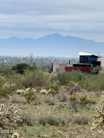 a view of swimming pool patio and outdoor seating