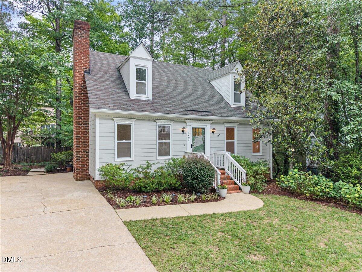 4404 Lancashire Drive Raleigh, NC 27613 - Photo 3 of 37 02-DJI_20260714022029_0099_D