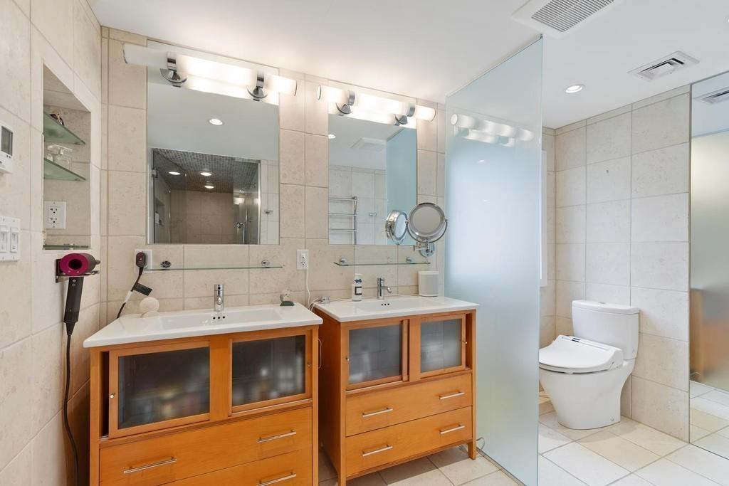 20 Ledgewood Road Weston, MA 02493 - Photo 19 of 34 a bathroom with a sink and a mirror