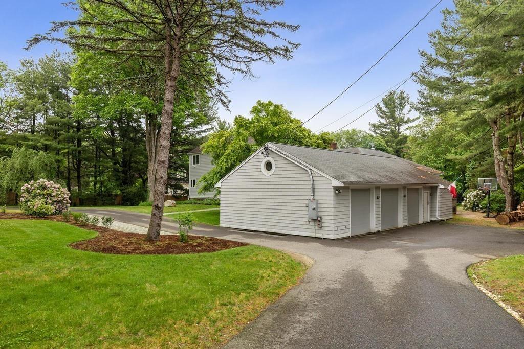20 Ledgewood Road Weston, MA 02493 - Photo 28 of 34 a house view with a garden space