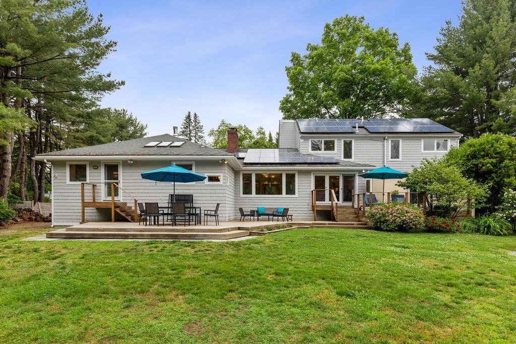 20 Ledgewood Road Weston, MA 02493 - Photo 32 of 34 a front view of house with yard and outdoor seating