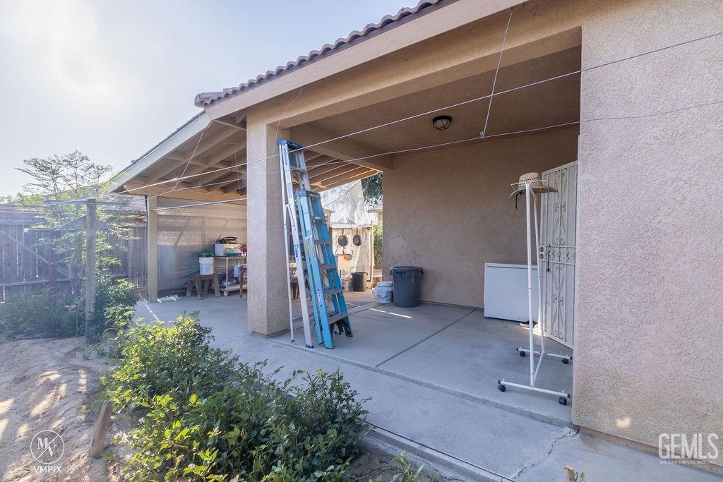 Undisclosed Address Delano, CA 93215 - Photo 16 of 23 a view of a porch with seating area