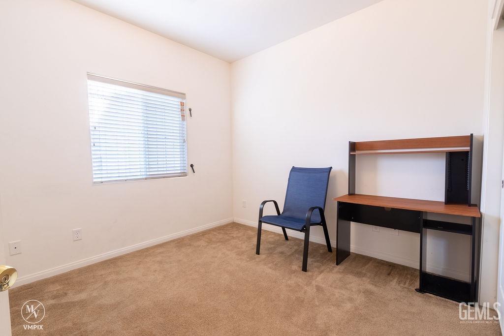 Undisclosed Address Delano, CA 93215 - Photo 8 of 23 a living room with furniture and a window