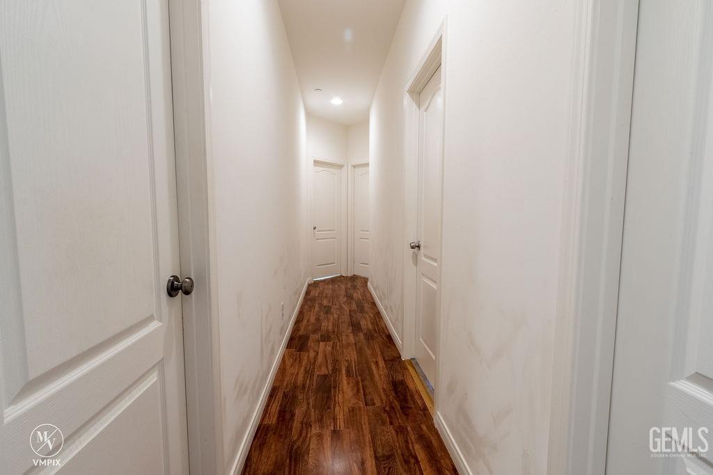 Undisclosed Address Delano, CA 93215 - Photo 10 of 23 a view of a bathroom from a hallway