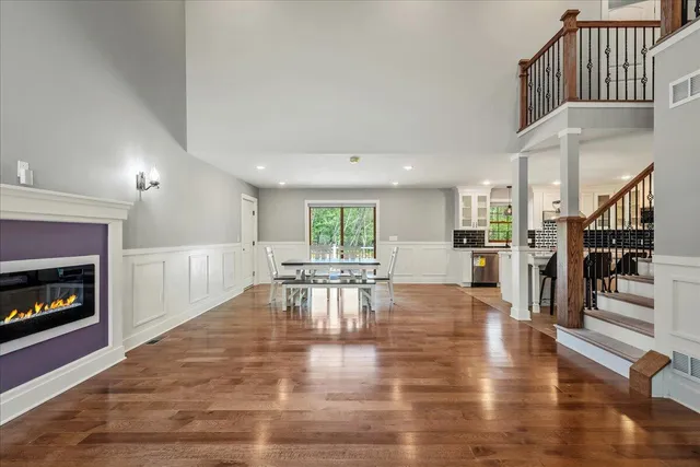 a view of hallway with wooden floor