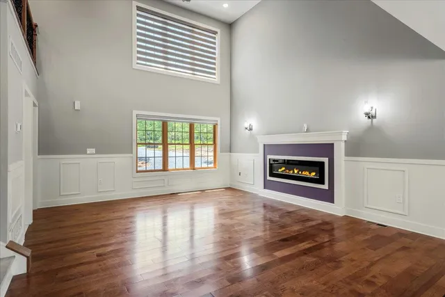 a view of a backyard with large trees