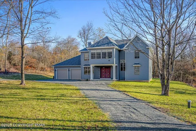 a view of living room with washer and dryer