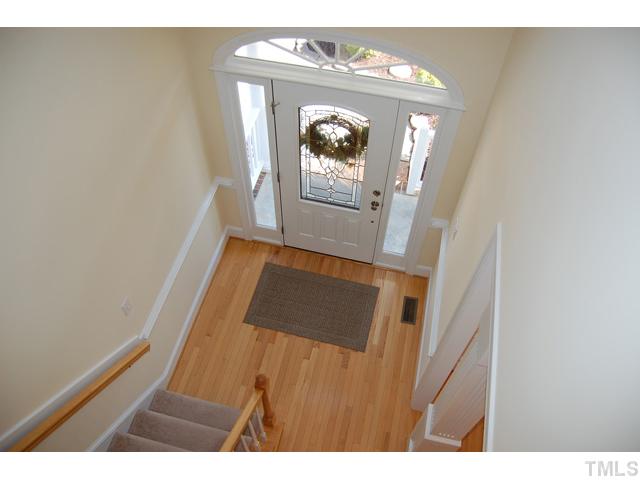 1600 Kendall Hill Road Willow Spring, NC 27592 - Photo 3 of 25 a view of a hallway with wooden floor