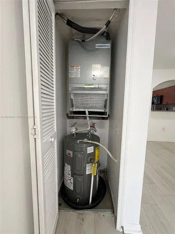 a view of storage and utility room