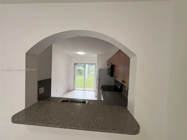 a view of a livingroom with a fireplace