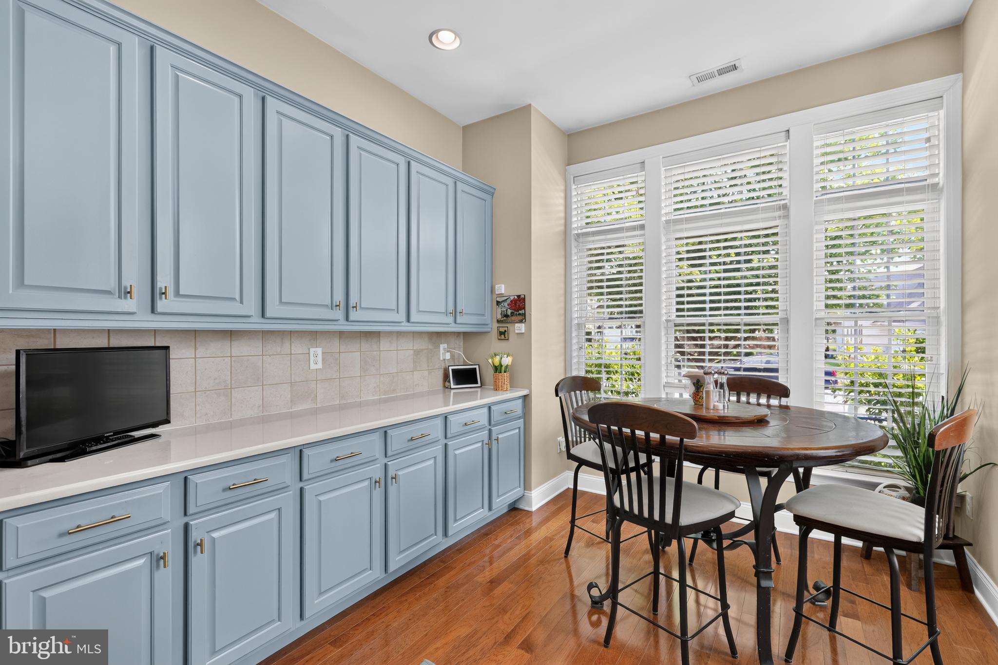 517 Logan Road Phoenixville, PA 19460 - Photo 7 of 43 Charming kitchen with blue cabinetry.