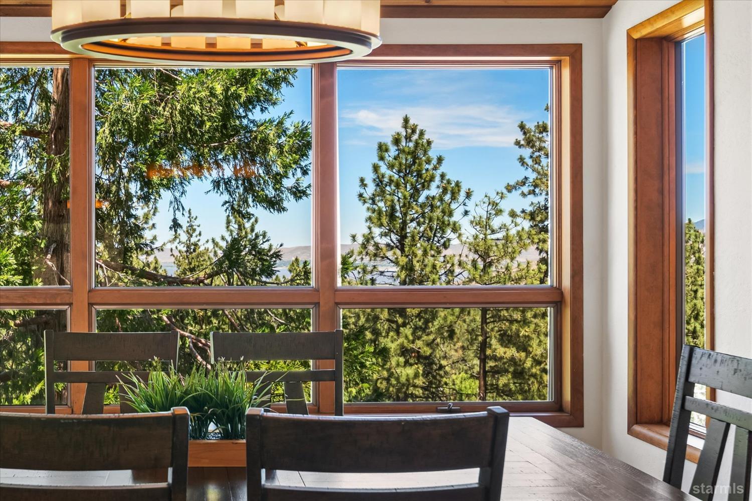 4201 Sandy Circle Carson City, NV 89703 - Photo 20 of 40 a view of a room that has a large window and wooden floor