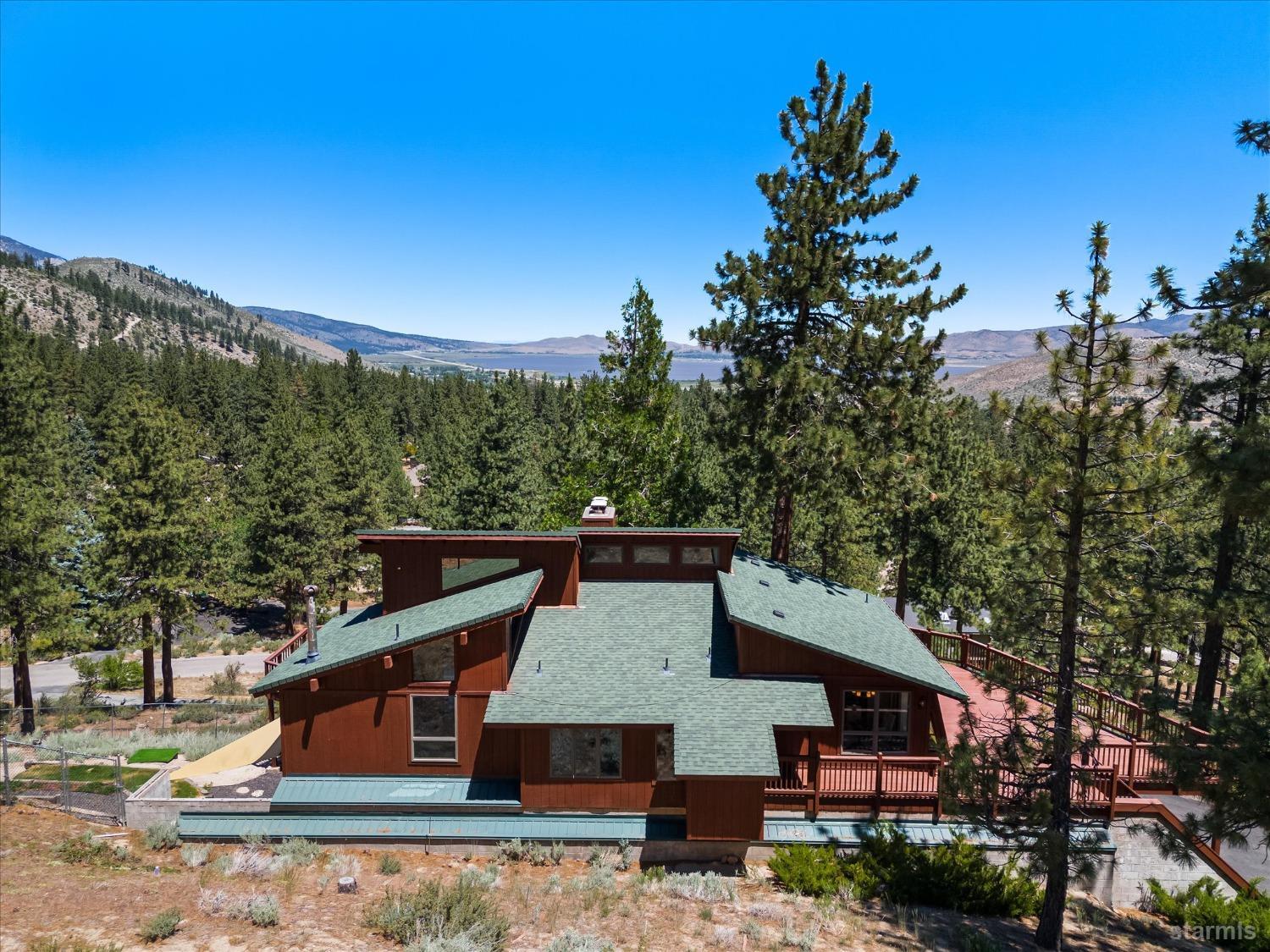 4201 Sandy Circle Carson City, NV 89703 - Photo 3 of 40 a view of a house with a yard