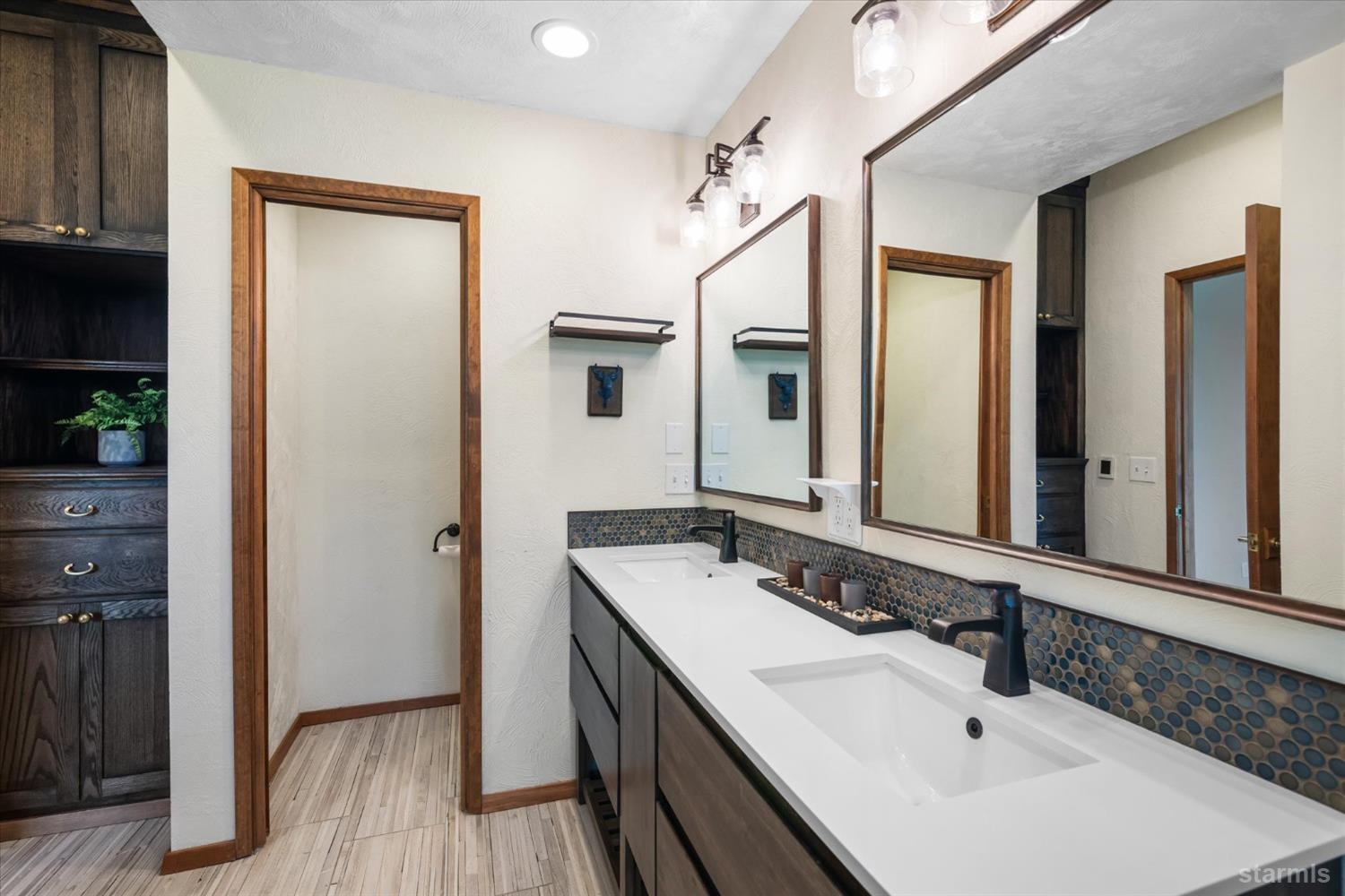 4201 Sandy Circle Carson City, NV 89703 - Photo 31 of 40 a bathroom with a sink and a mirror