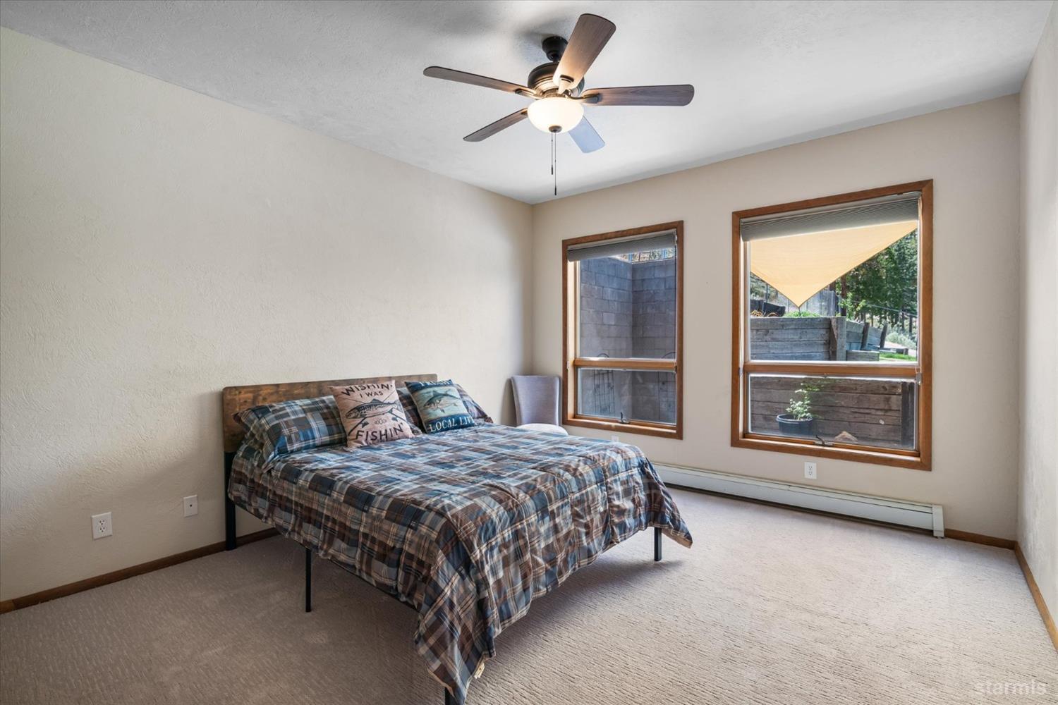 4201 Sandy Circle Carson City, NV 89703 - Photo 33 of 40 a bedroom with a bed and a large window
