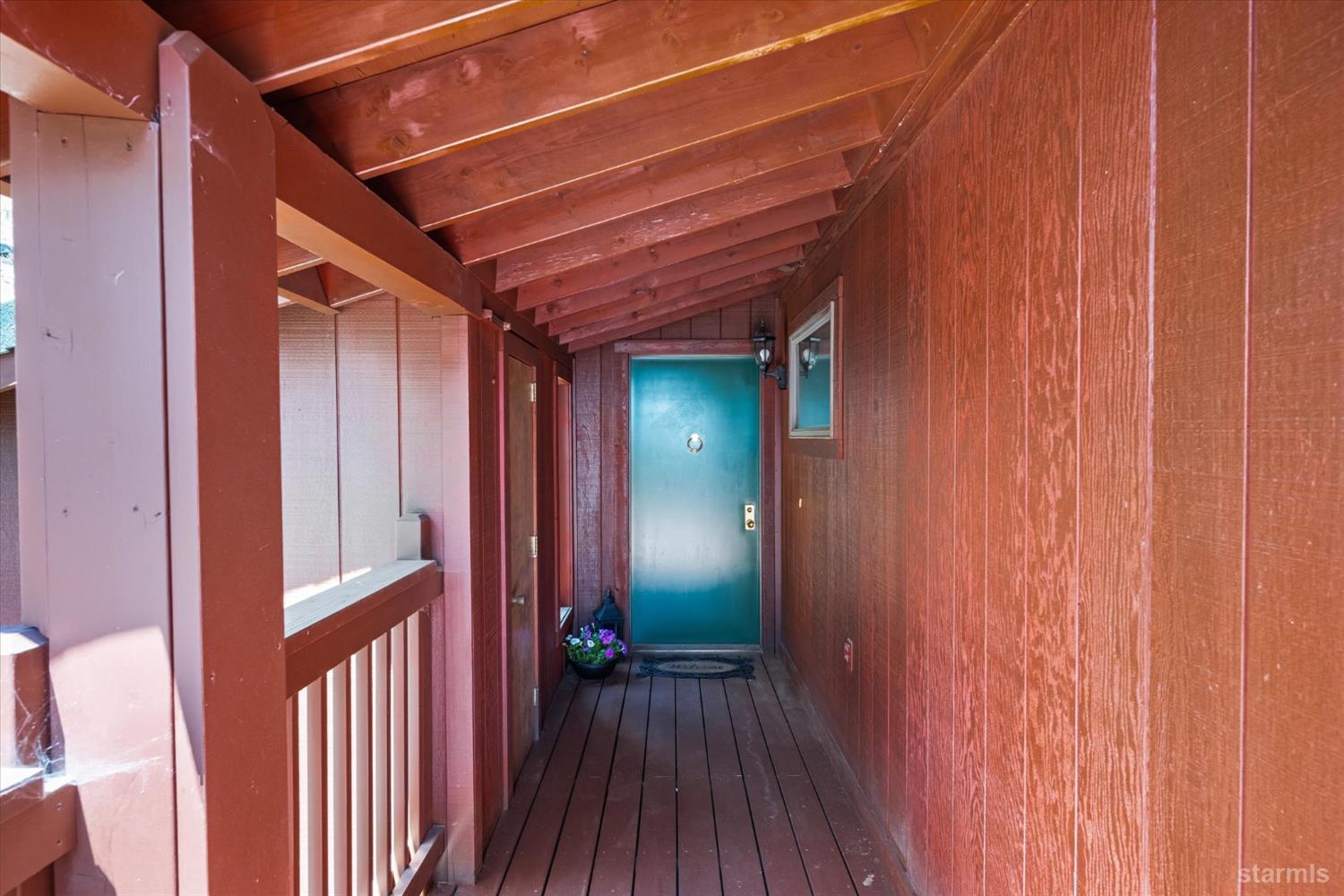4201 Sandy Circle Carson City, NV 89703 - Photo 37 of 40 a view of a hallway with wooden floor